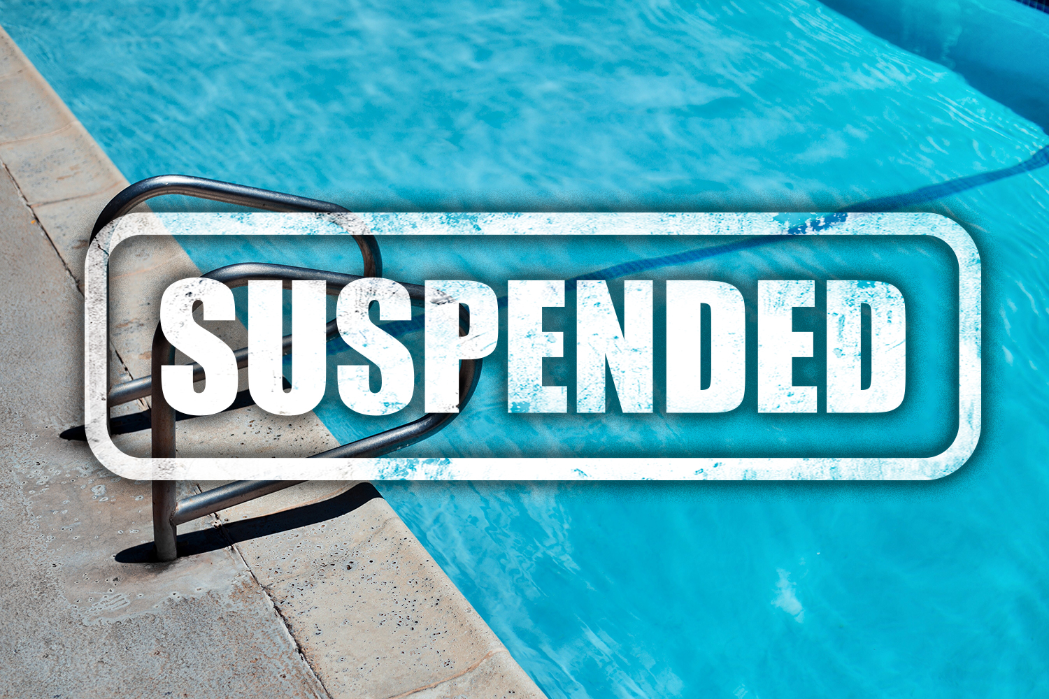 Swimming Pool with the word 'Suspended' superimposed